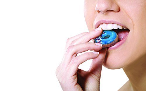 Female biting cookie